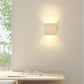 Wandlamp van licht of donker hout | Lignum