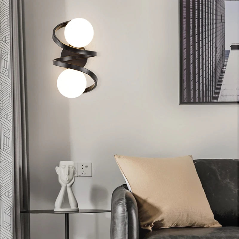 Wandlamp met krul zwart of goud 1- of 2-delig | Flora