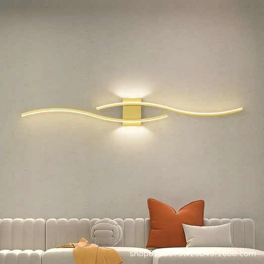 Langwerpige wandlamp in goud en zwart | Aurum